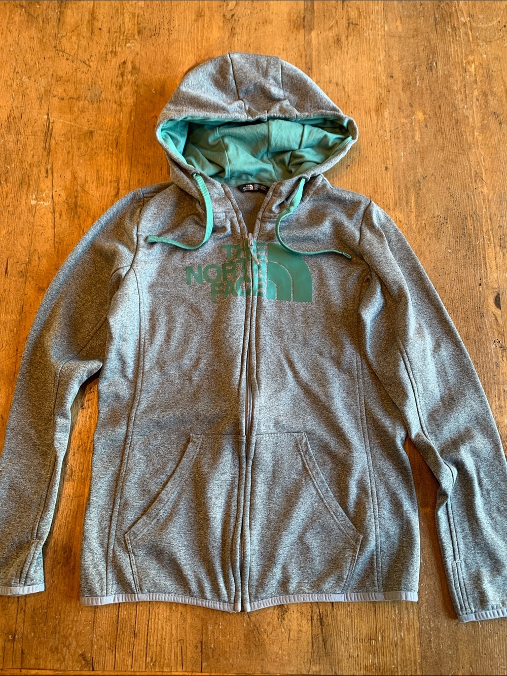 The North Face Gray Hoodie with Teal Logo and Lining